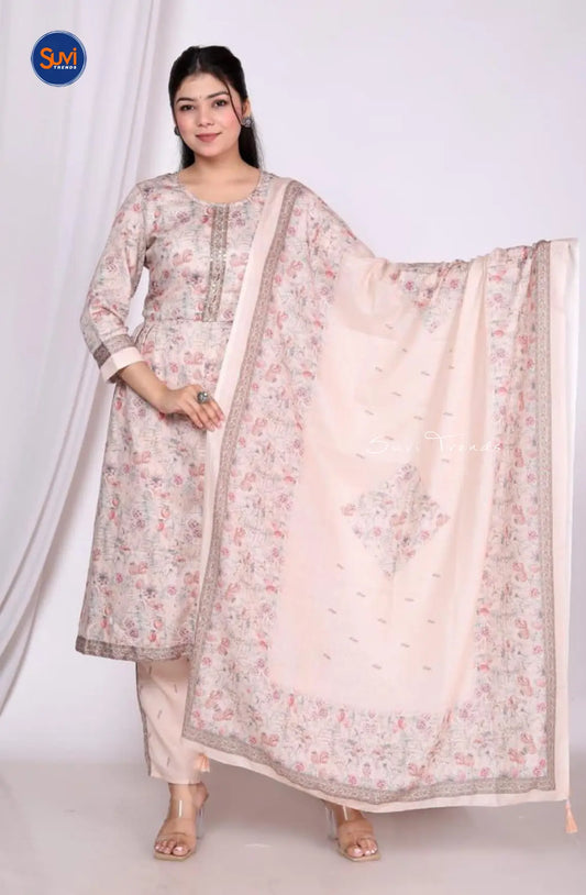 Experience the beauty and elegance of our All Over Printed Anarkali Suit Set in beige. Made with high-quality muslin fabric, this set features a round neck and 3/4 sleeves for a comfortable fit. Complete with pants and a dupatta, this Indian ethnic wear is perfect for any occasion. Get the best price and conveniently buy online in Malaysia. Elevate your wardrobe with this must-have set.