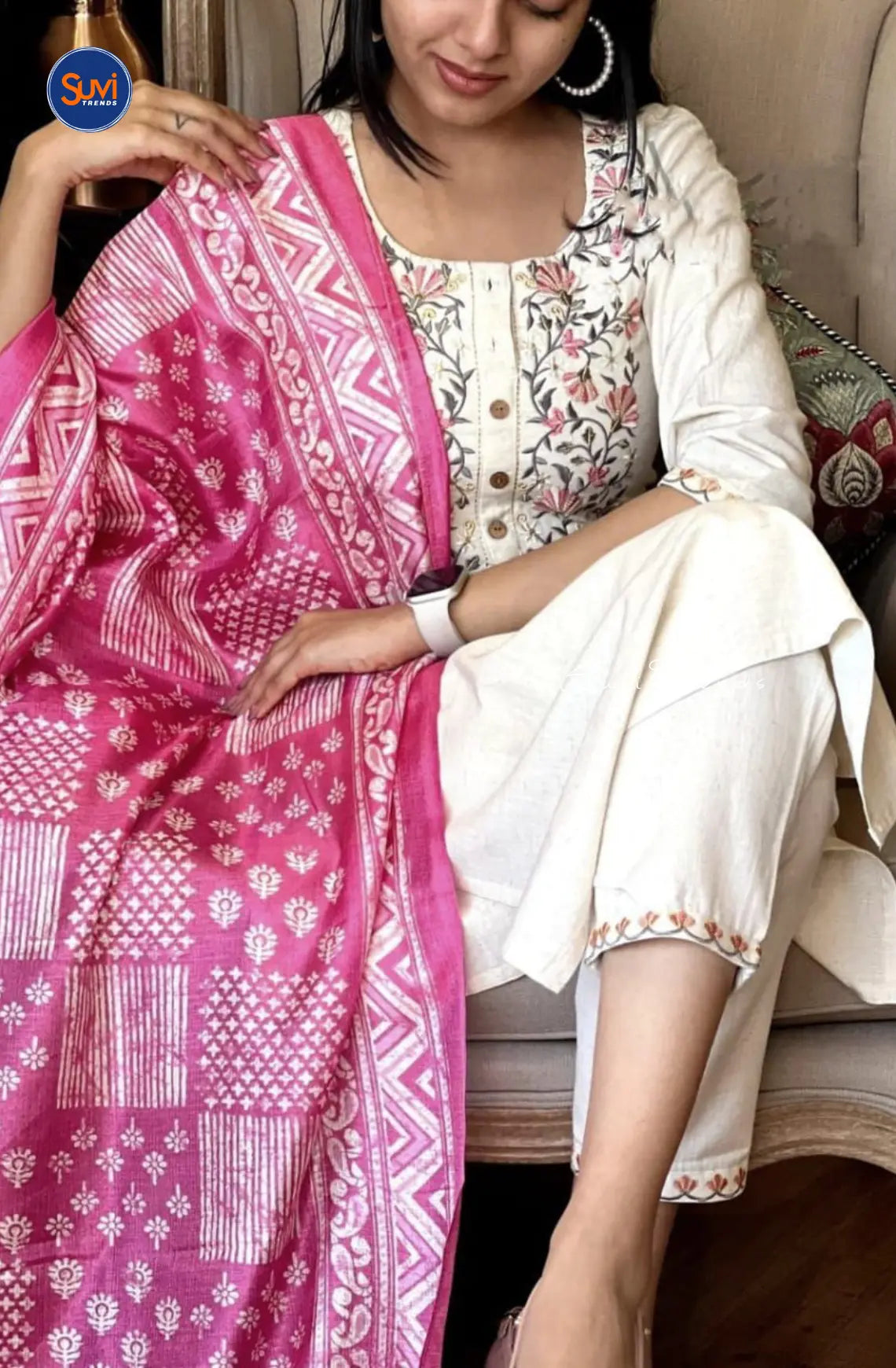 Elevate your ethnic wear game with this off-white cotton kurta set! Featuring intricate floral embroidery, a round neck, and 3/4 sleeves, this set is perfect for any occasion. The straight cut design, paired with a pant and dupatta, creates a flattering silhouette. Shop now for the ultimate Indian ethnic wear experience.