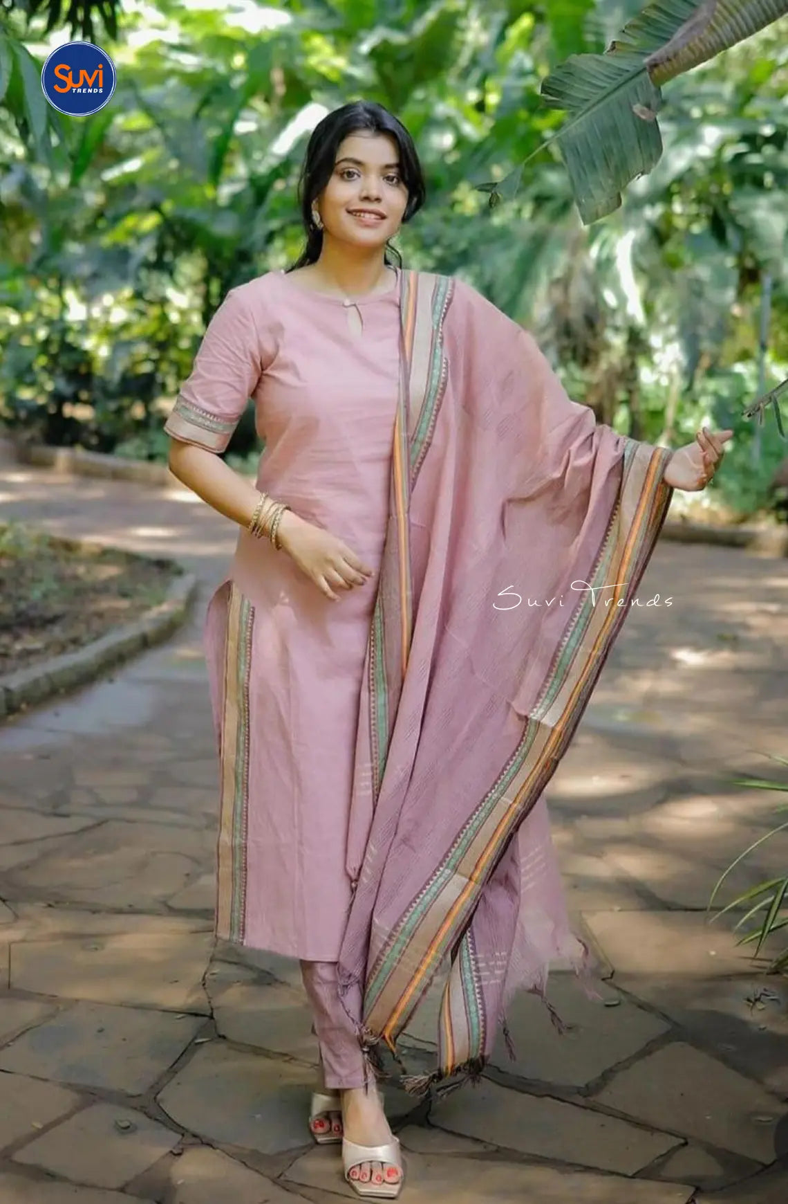 Experience the elegance and comfort of our Pure South Cotton Suit Set in a charming light pink color. The keyhole neck and half sleeves with zari border add a touch of traditional sophistication. This 3 piece set includes a top, bottom, and banarasi dupatta with zari border, perfect for festive and ethnic occasions. Celebrate Deepavali in style. Available for purchase now in Malaysia.